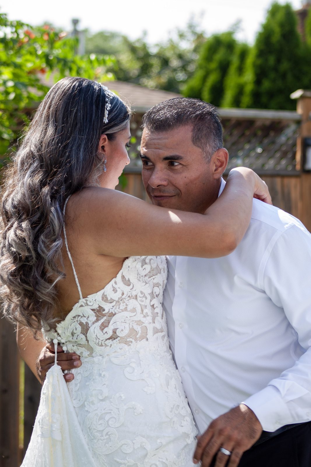 Newlyweds sharing a dance at their wedding reception